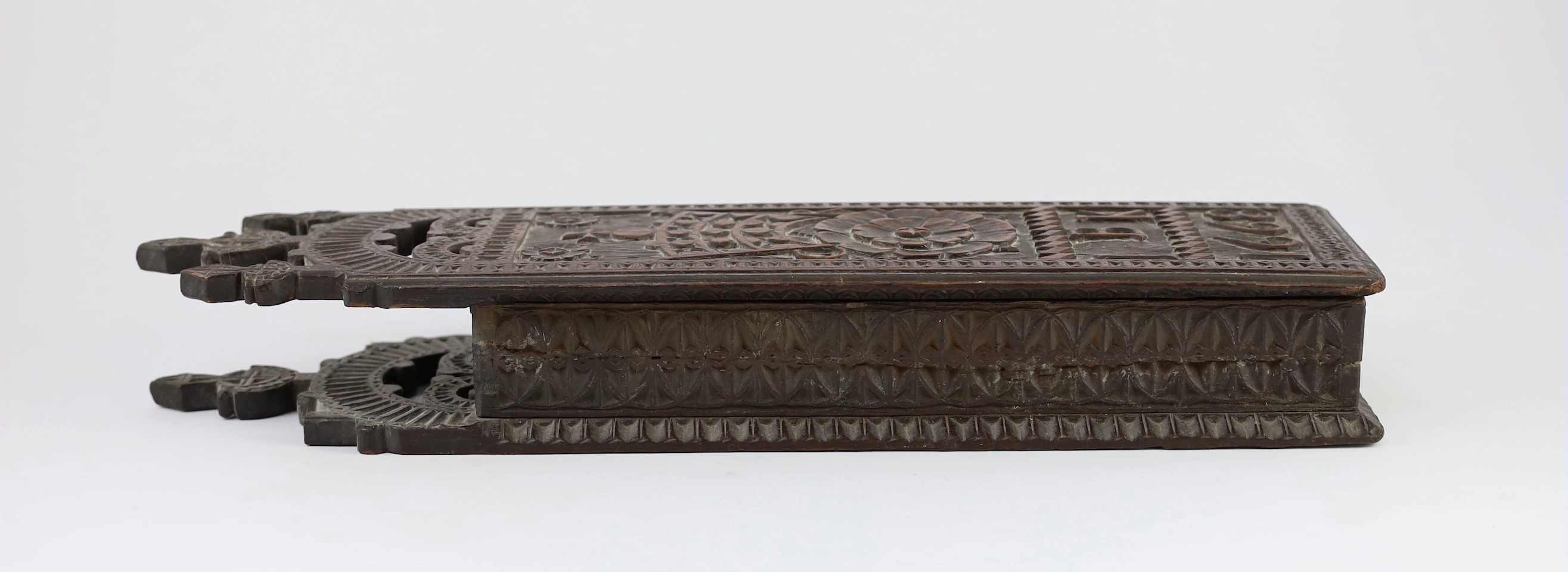 An antique carved oak cased tobacco rasp, 49 x 13cm depth 7cm